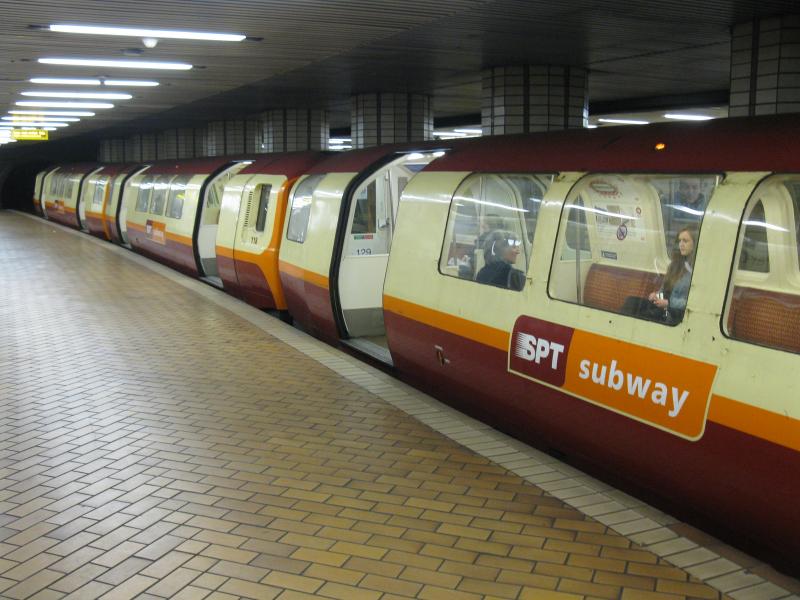 Photo of SPT Subway train at the outer rail platform at Partick in the latest SPT livery.