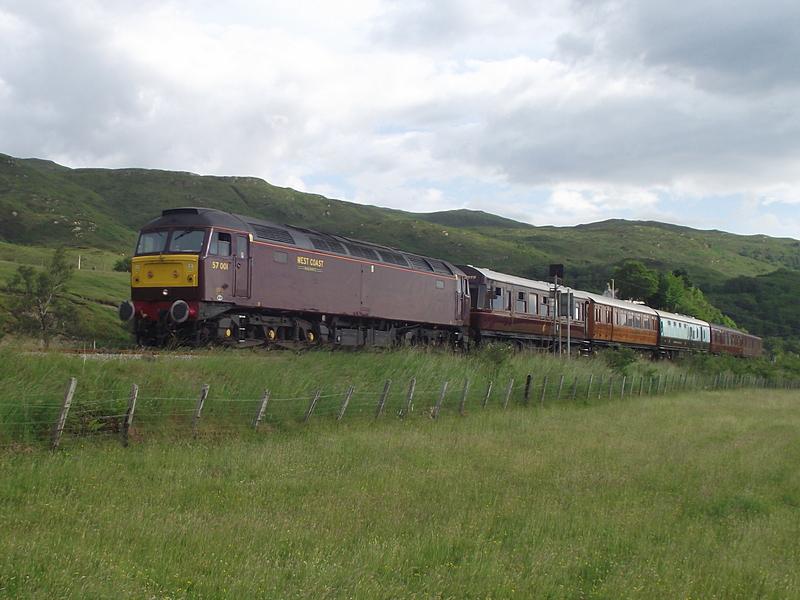 Photo of 57001 + Queen of Scots stock at Strathcarron - 06 July 2012