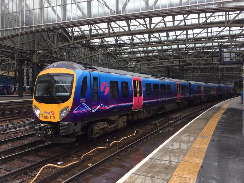 Photo of TPE 185110 departing Glasgow Central